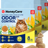 Three HoneyCare Odor Control cat litter bags arranged in a fan shape with loose samples of the tan cat litter and corn graphics displayed in front on a white background.