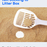 A white plastic cat litter scoop shown over tan cat litter, with text reading 'Not Sticking to Litter Box' and 'No sticky residue at the bottom.'.